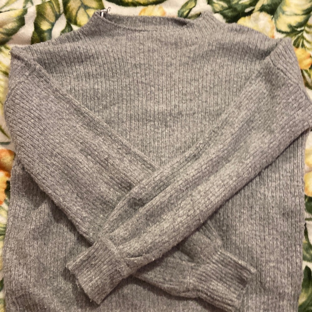 This is a gray knitted sweater so comfortable great for cooler mornings